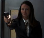 Amy Acker in a suit and tie. With scars. And holding a gun, with a malevolent grin. Now THAT'S me.